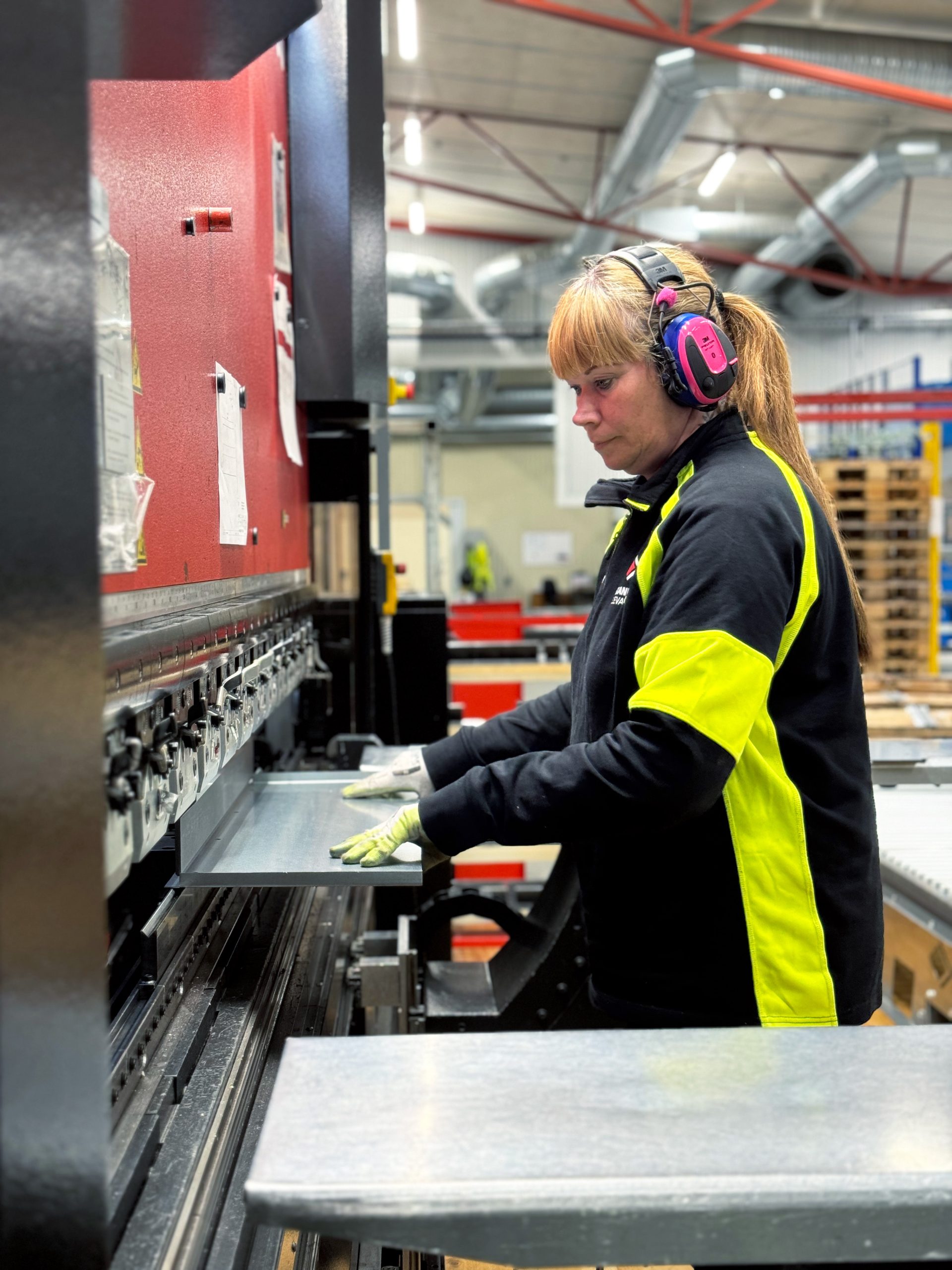 A woman in working uniform and noise